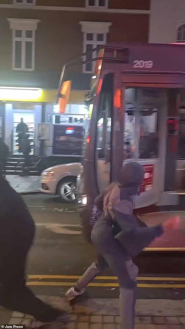 Moment feral youths go on rampage through city centre launching eggs at bus drivers and shoppers