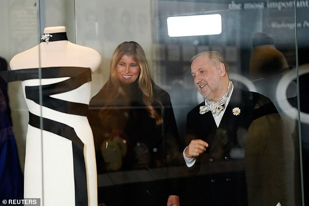 Melania and designer Hervé Pierre admire the 2025 inaugural gown