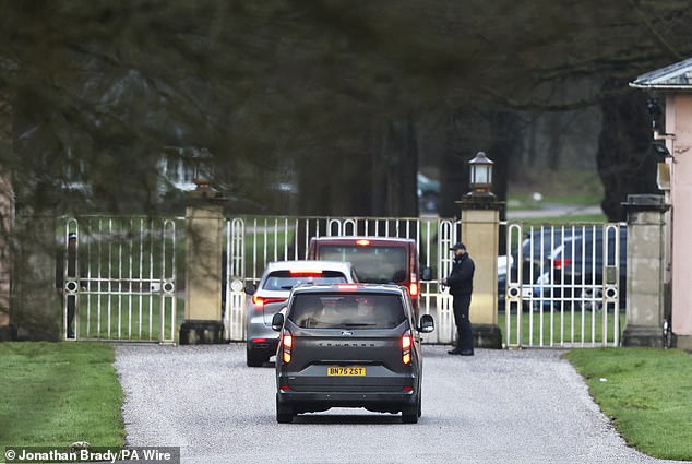 Police vans approach Royal Lodge, the former Windsor residence of Andrew Mountbatten-Windsor, today, as searches continue following his arrest