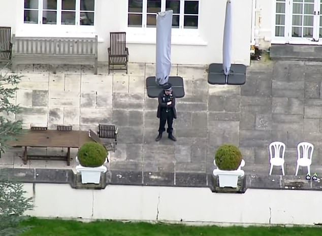 An aerial view of police visiting Royal Lodge in Windsor, Berkshire, on Friday 20 February 2026