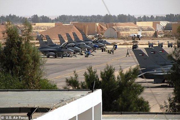 Chilling sign of Trump's 'imminent' Iran attack as more than 60 US warplanes swarm key army base