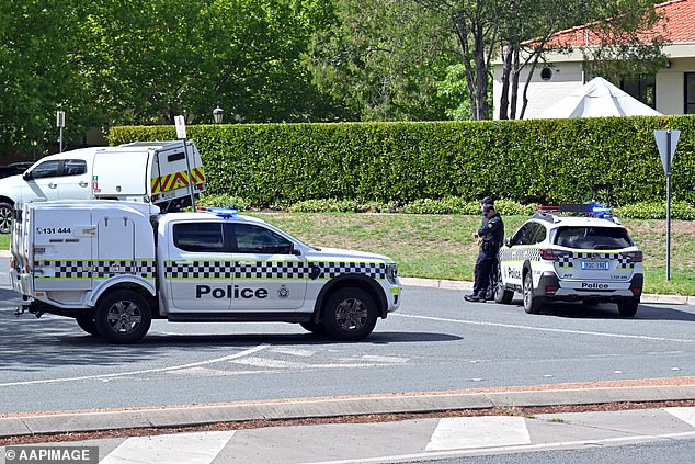 Police (pictured at the Hyatt Hotel) allege the incident was intended to cause panic and fear among attendees of a defence conference