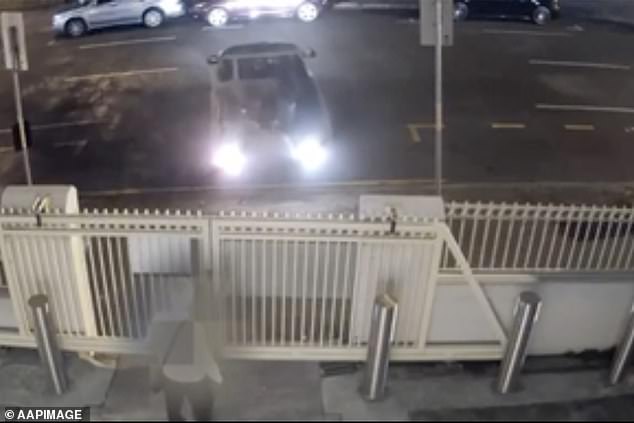 Officers say the Toyota Hilux utility knocked down the gates to The Brisbane Synagogue