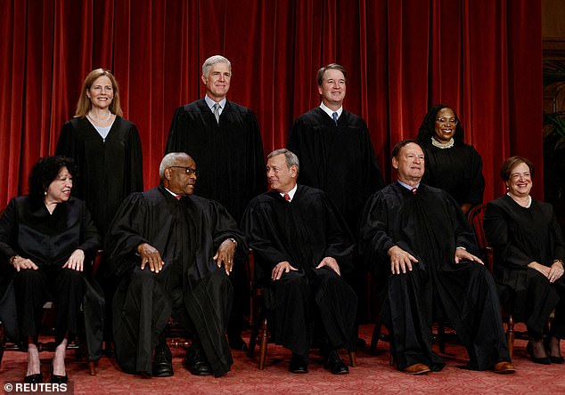 Justices Amy Coney Barrett and Neil Gorsuch (upper left) ruled with the liberal wing of the Court against President Donald Trump. Justice Brett Kavanaugh (second from right), a Trump appointee, wrote the dissent. Chief Justice John Roberts (center, first row) penned the ruling
