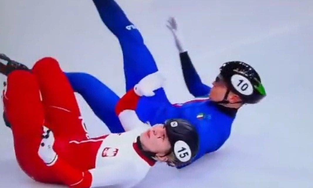 SCARY: Olympic Speed Skater Taken Off Ice On Stretcher After Getting Cut With A Blade