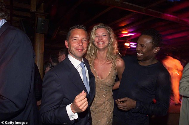 Junkermann (centre) pictured with German businessman Patrick Faber-Castell (left) and Trinidadian-German singer Haddaway