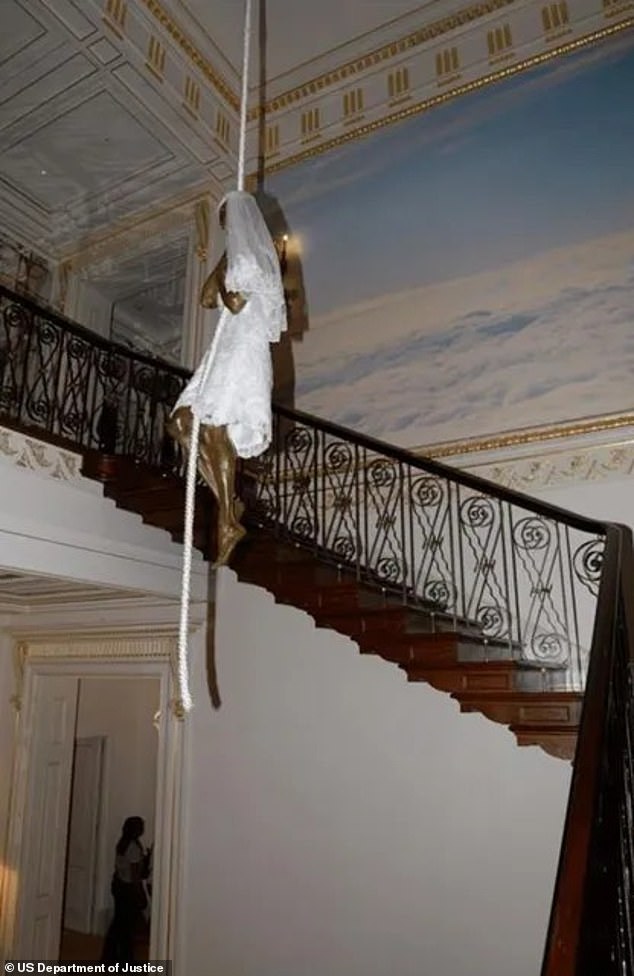 One of the most unsettling images released by the DOJ shows a life-sized bronze sculpture of a woman or girl dressed in a bridal gown. The photos were taken in 2019 at Epstein's Manhattan townhouse after his arrest as part of the FBI's investigation into his sex trafficking