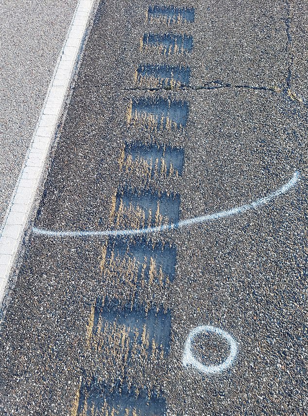 Photos of police chalk outlines showed where his body (marked by the white line) and at least one of his teeth (marked by the circle) were found