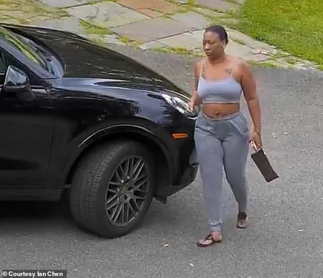 Goode is seen dressed down on the driveway of her mansion, in her black Porsche Cayenne with a personalized license plate