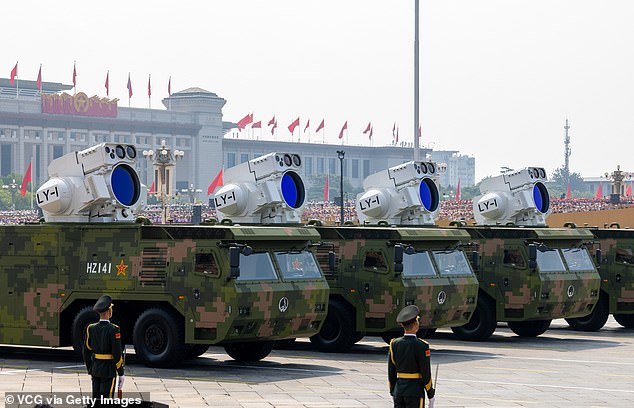 US officials have repeatedly accused China of a lack of transparency on their nuclear testing. Pictured above is a laser weapon during a military parade in Beijing last September