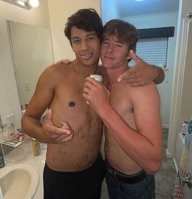 Presgrove (left) poses with his best friend Jack Newton during the party. Newton has since become a favorite target of those who believe Presgrove was murdered