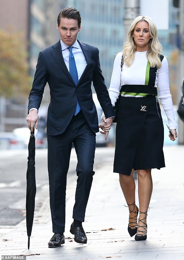 Oliver Curtis on the way to court with wife Roxy Jacenko who wore $1,100 YSL suede lace-up heels and dressed in thousands of dollars' worth of designer clothes during the tense, three-week insider trading trial which ended in his conviction and imprisonment