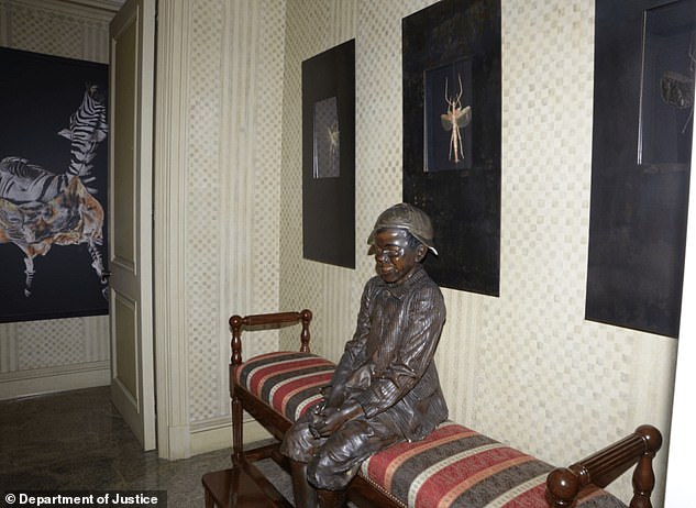 Epstein's home had a statue of a young boy below images of insects