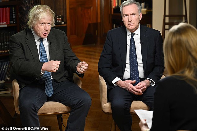 Defence Secretary John Healey has snubbed a call from Boris Johnson (pictured giving a BBC interview with former UK forces chief Tony Radakin) for troops to be deployed to Ukraine immediately