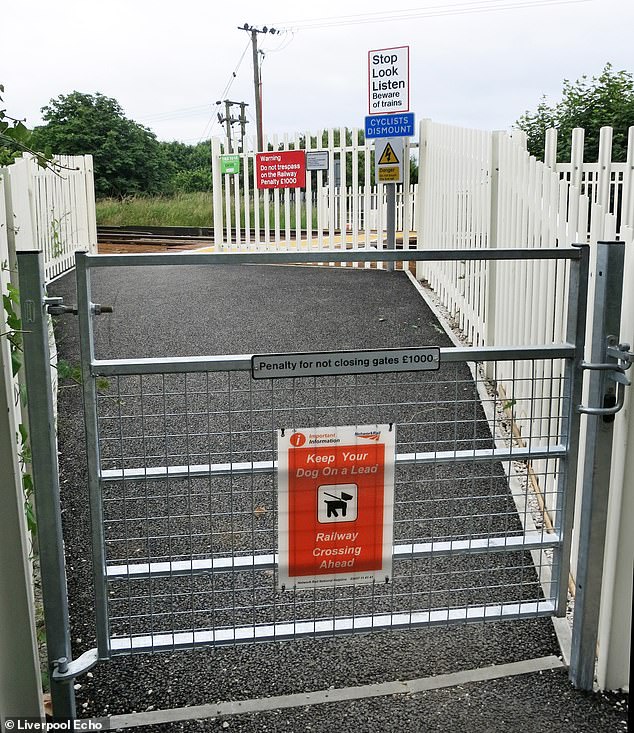 Runner listening to music on his headphones died after being hit on level crossing by a train, inquest hears