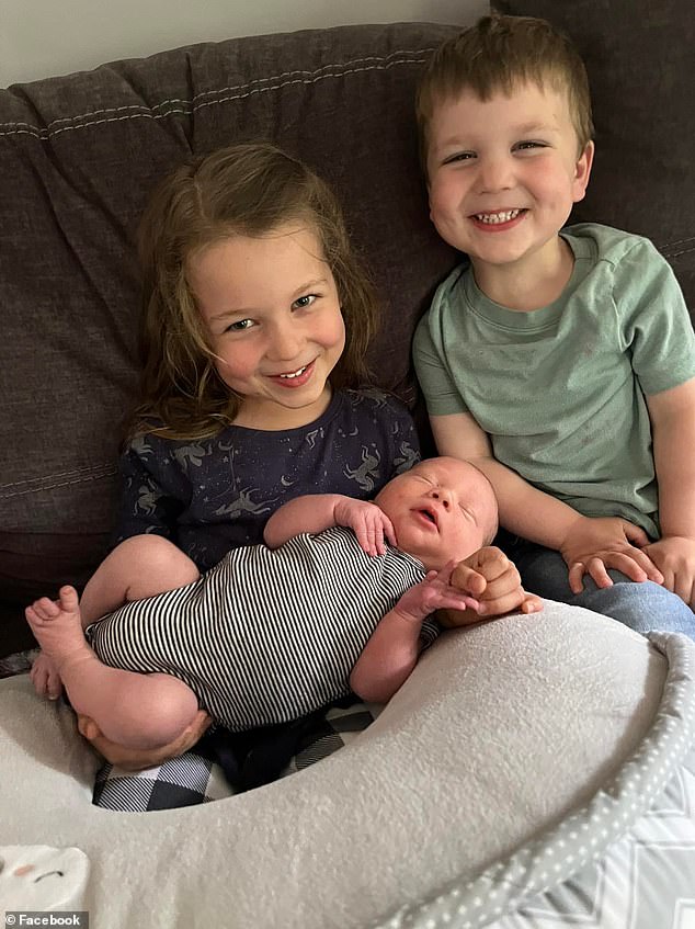 Clancy's three children and alleged victims, Cora, five (left), Dawson, three (right), and eight¿month¿old Callan (center), are pictured