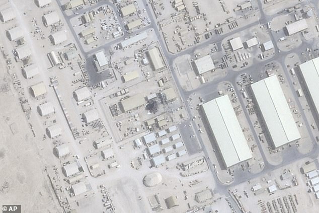 This satellite image from Planet Labs PBC shows damage after an Iranian attack at the Al Udeid Air Base outside of Doha, Qatar, June 25, 2025