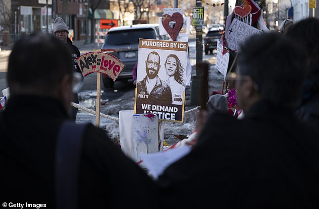 People gather at a memorial for Alex Pretti who was shot and killed by an ICE agent last month on February 12, 2026 in Minneapolis, Minnesota