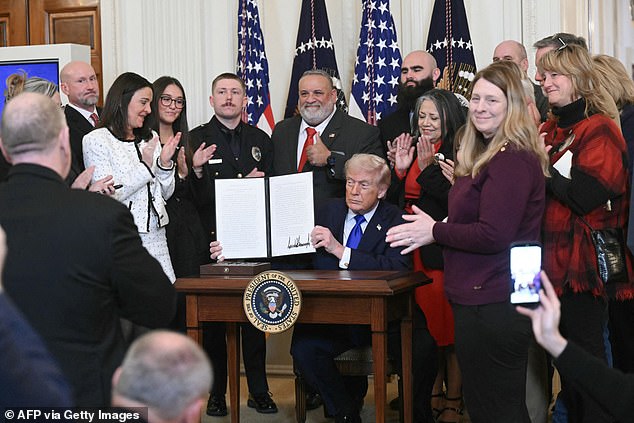 Trump welcomed angel families onto the stage as a he signed the National Angel Family Day Proclamation