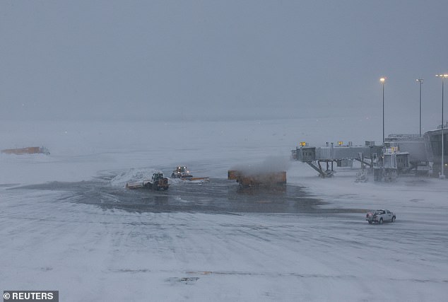 Almost every flight delayed or canceled at NYC and Boston airports as blizzard brings 20 inches of snow to Empire State