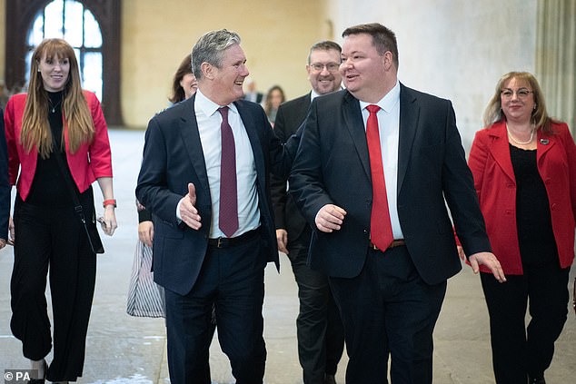 Andrew Western (pictured alongside Sir Keir Starmer in January 2023) said: 'These arrests demonstrate the power of agencies working together'