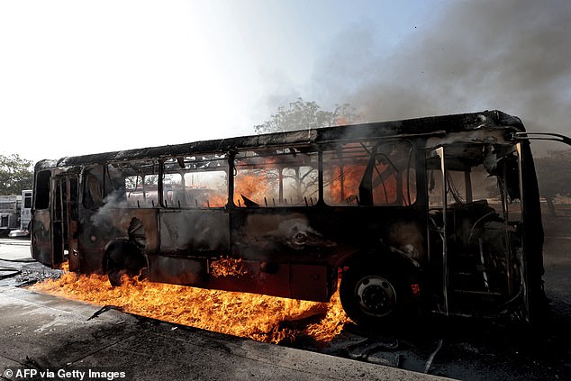 A burning bus set on fire by organized crime groups at one of the main avenues in Zapopan, state of Jalisco, Mexico, on Sunday