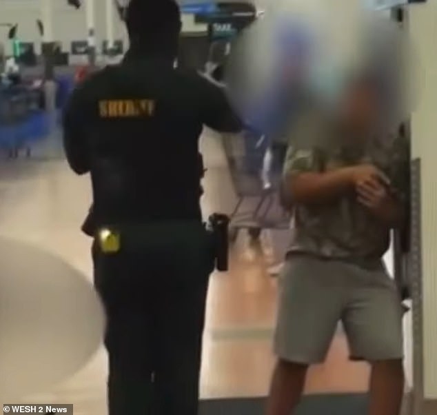 Video obtained by the outlet showed security in what appeared to be a stand-off with one of the suspects in the Walmart