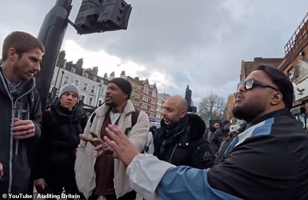 Moment Muslim man shouts 'we don't want to worship a Jewish man' at Christian preacher in Whitechapel
