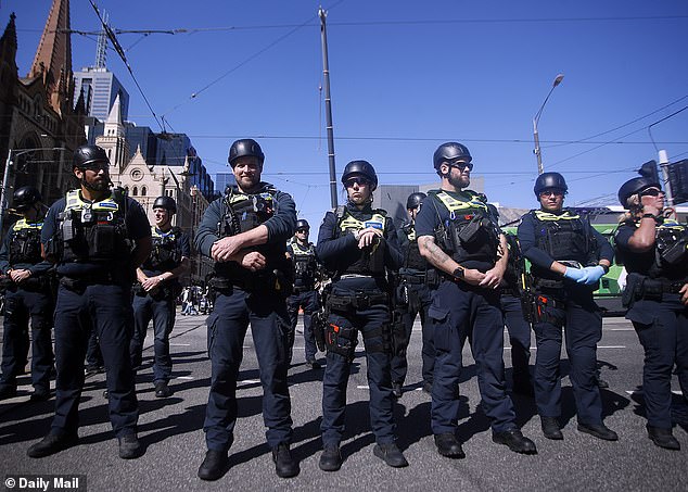 Victoria Police officers stood back and let the peaceful protest play out