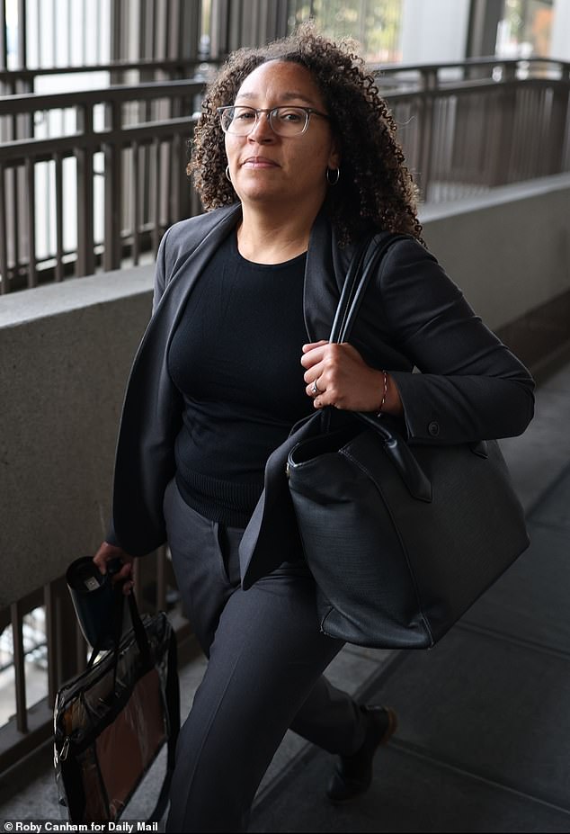Nick's public defender, Kimberly Green, is seen arriving at Los Angeles criminal court ahead of his hearing on Monday