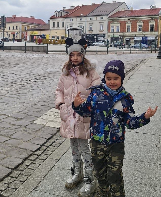Mrs Ponomarova's children Nikita and Sophia in Poland where the family stayed for three months before they settled in the UK