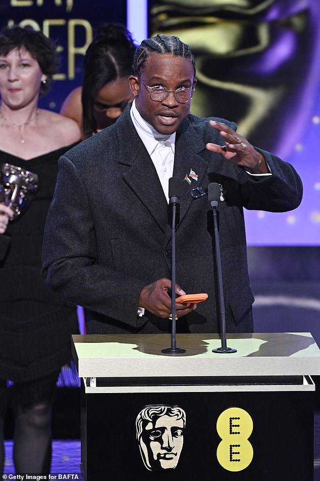 In contrast, the BBC edited out 'Free Palestine' from an acceptance speech made by filmmaker Akinola Davies Jr. (pictured)