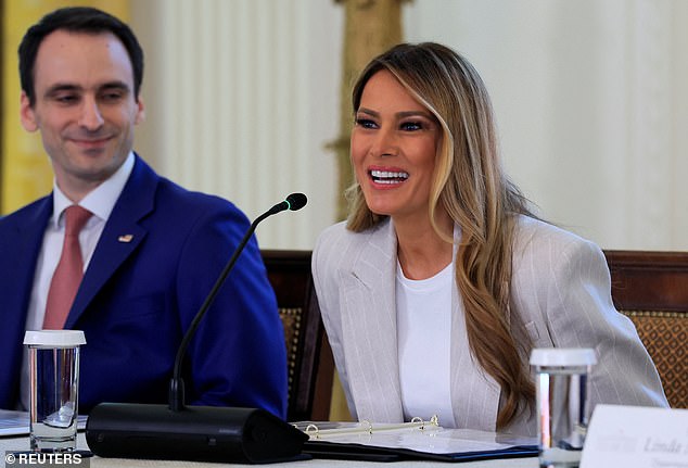 First Lady Melania Trump smiles as she addresses a crowd of tech leaders in the East Room in September. During her speech, she preached caution when it came to AI, telling attendees 'as leaders and parents, we must manage AI's growth responsibly'