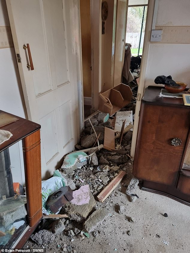 Bricks from the front of the house also flew through the hallway