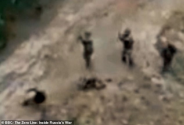 Footage showing two soldiers being shot after attempting to flee