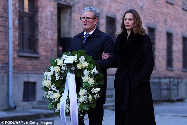 The Prime Minister has previously spoken about the importance of his children recognising their Jewish heritage (Pictured: Sir Keir and Victoria Starmer lay a wreath at Auschwitz in January 2025)