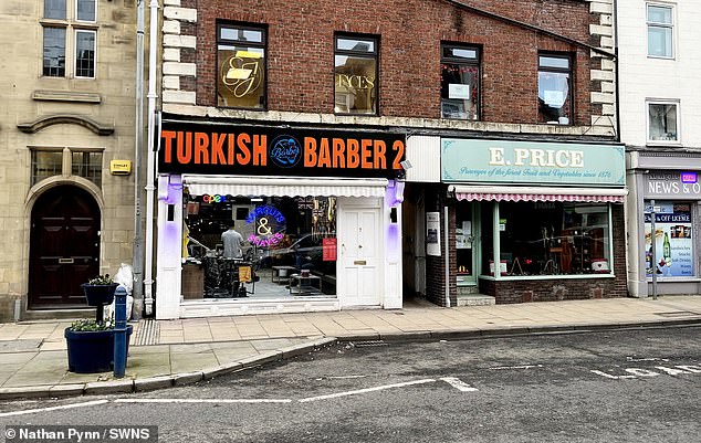 Turkish barber is ordered to tear down 'garish' sign which is 'harming' character of medieval market town