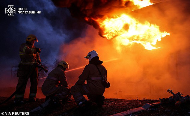 Firefighters work at the site of a Russian strike, amid Russia's attack on Ukraine, in Poltava region, Ukraine, in this handout picture released February 20, 2026