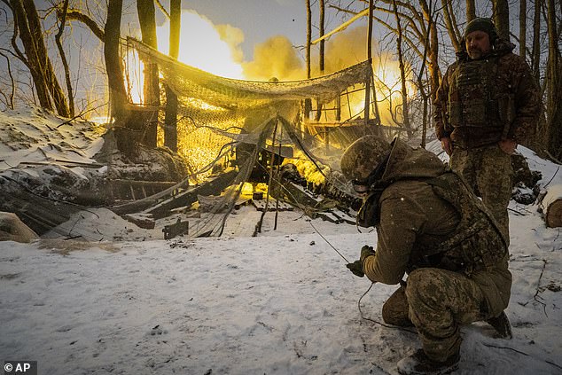 Ukrainian soldiers fire at Russian positions on the front line in the Kharkiv region of Ukraine on February 18, 2026
