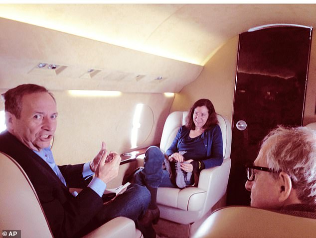 An undated photo released by Democrats on the House Oversight Committee showed Summers, his wife Elisa New and Woody Allen on an airplane