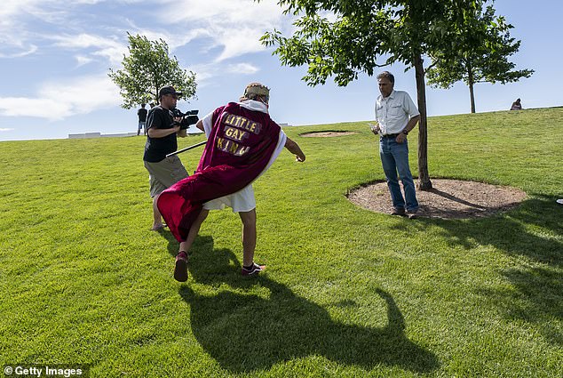 Pettinger is a frequent attendee at counterprotests and public government hearings. He's pictured above in 2021 at a protest pretending to be a 'Little Gay King'
