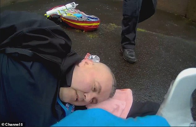Jeff is surrounded by officers who provide life-saving first aid including using tourniquets