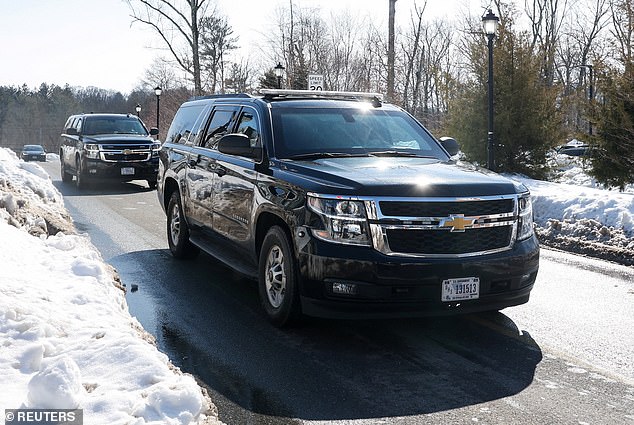 A motorcade arrives ahead of Hillary's deposition in Chappaqua, New York, today, as part of the House Oversight Committee investigation into Jeffrey Epstein