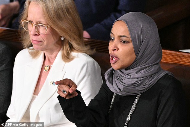 Ilhan Omar claims her guest was 'forcibly removed' from House floor during Trump's speech… as John Fetterman blasts Rashida Tlaib's vile slur at GOP lawmakers