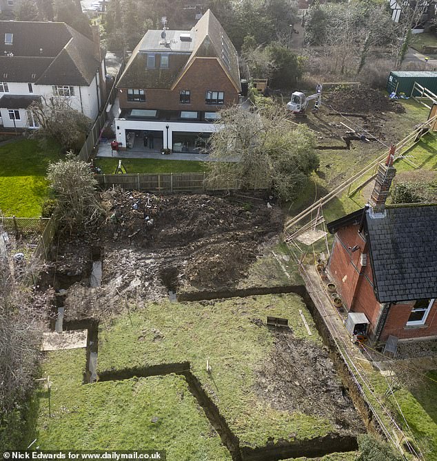 Mother at war with neighbours over plans to build 'ugly' five-bed newbuild home next to her £2.5m Victorian mansion