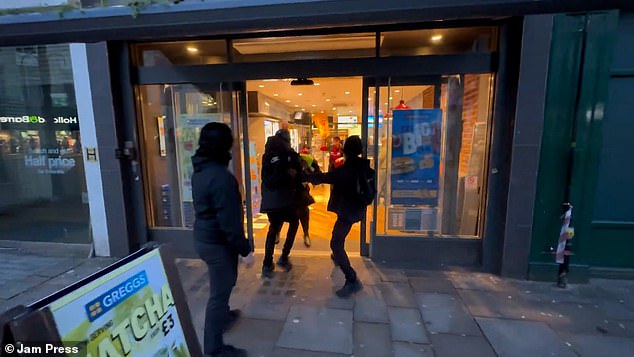 Moment security guard outside GREGGS is battered by pastry-stealing thug