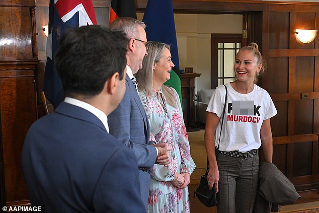 Grace Tame wore a shirt featuring the slogan: 'F*** Murdoch' at an Australian of the Year function the PM hosted at The Lodge in Canberra