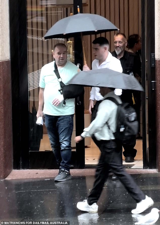 Ahmed al-Ahmed, escorted by an ABC Bullion security man, left the global gold trading premises after about 30 minutes in its upstairs rooms holding a bag of gold bars