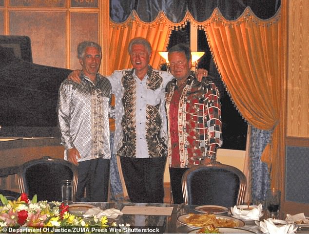 Jeffrey Epstein, Bill Clinton and an unidentified man in a photo from the Epstein files