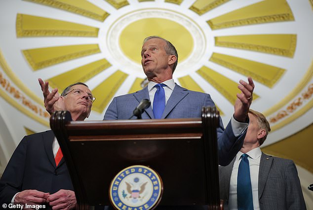 Trump's push for the bill, backed by House conservatives and his most loyal supporters ahead of the midterm elections, has put new pressure on Senate Majority Leader John Thune (center)